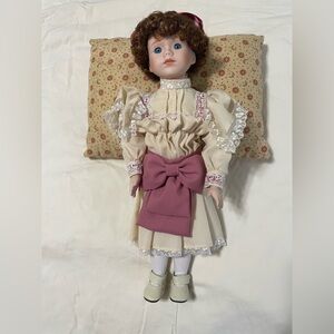 Porcelain Collector Doll with Cream Dress and Mauve Bow